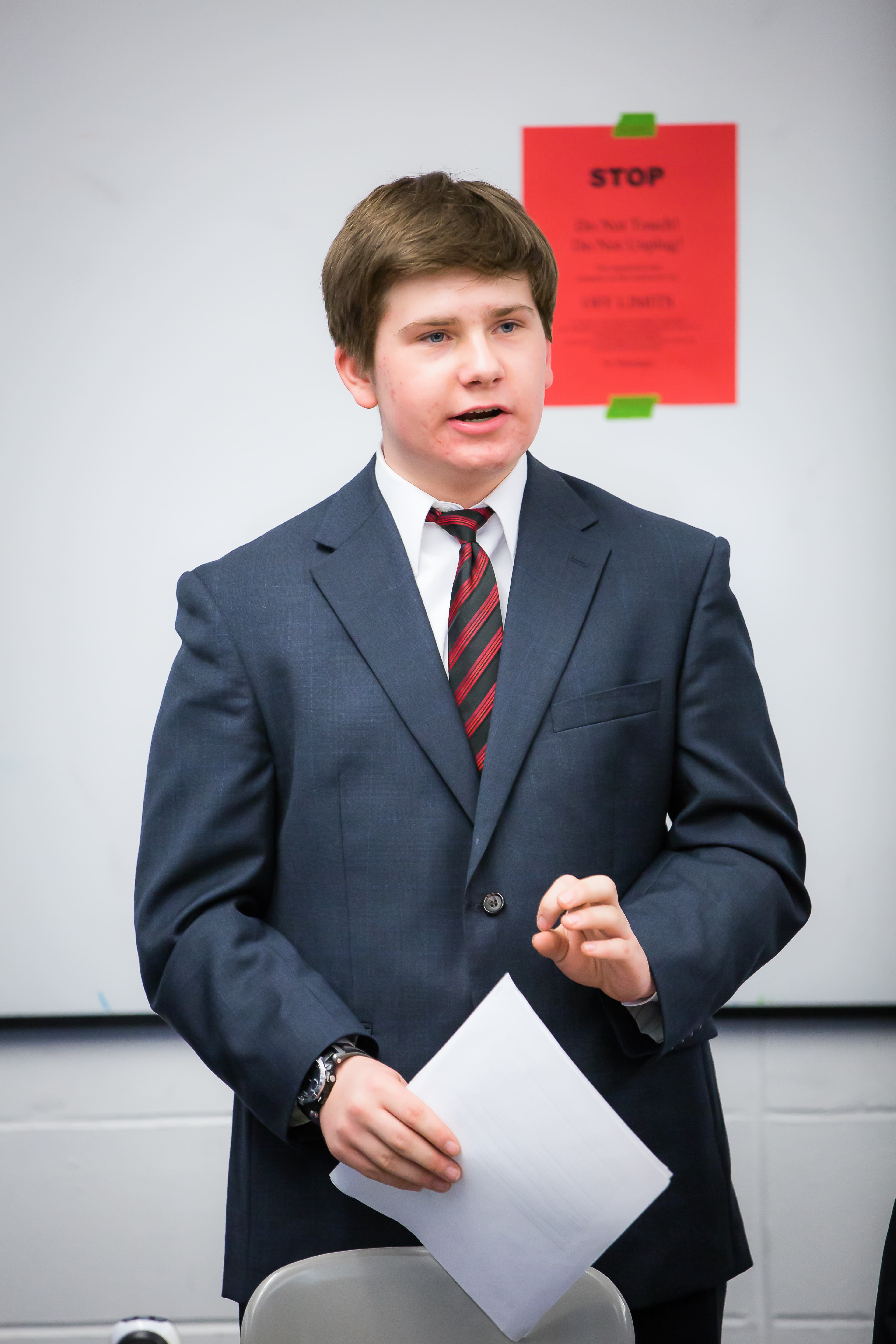 Club Debate League student presenting