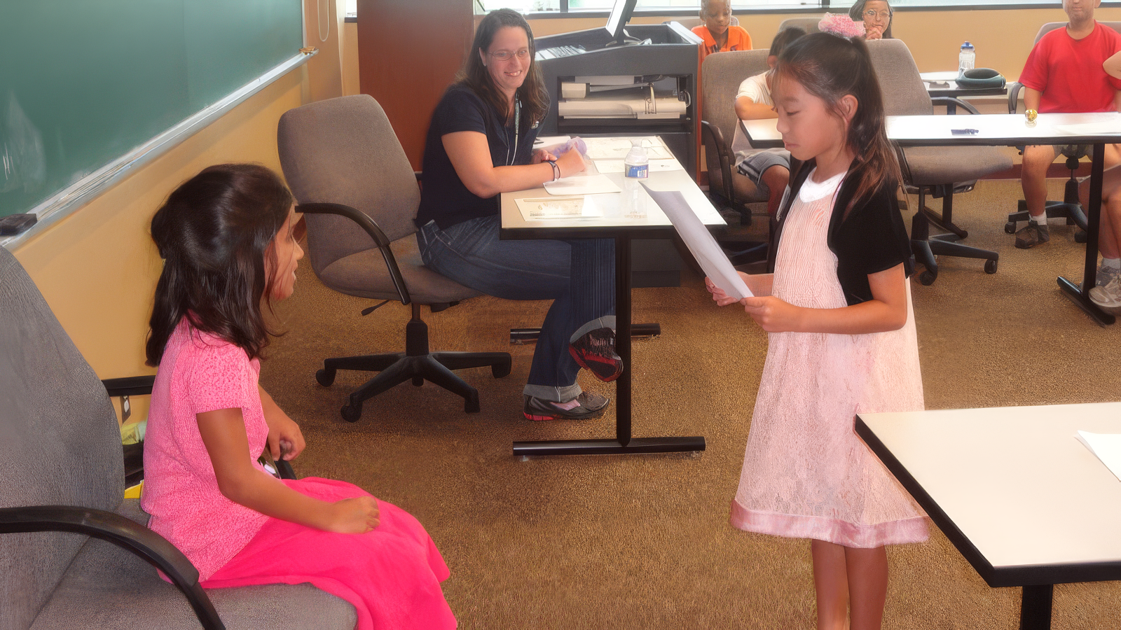 Students engaging in debate practice at Capitol Debate summer camp