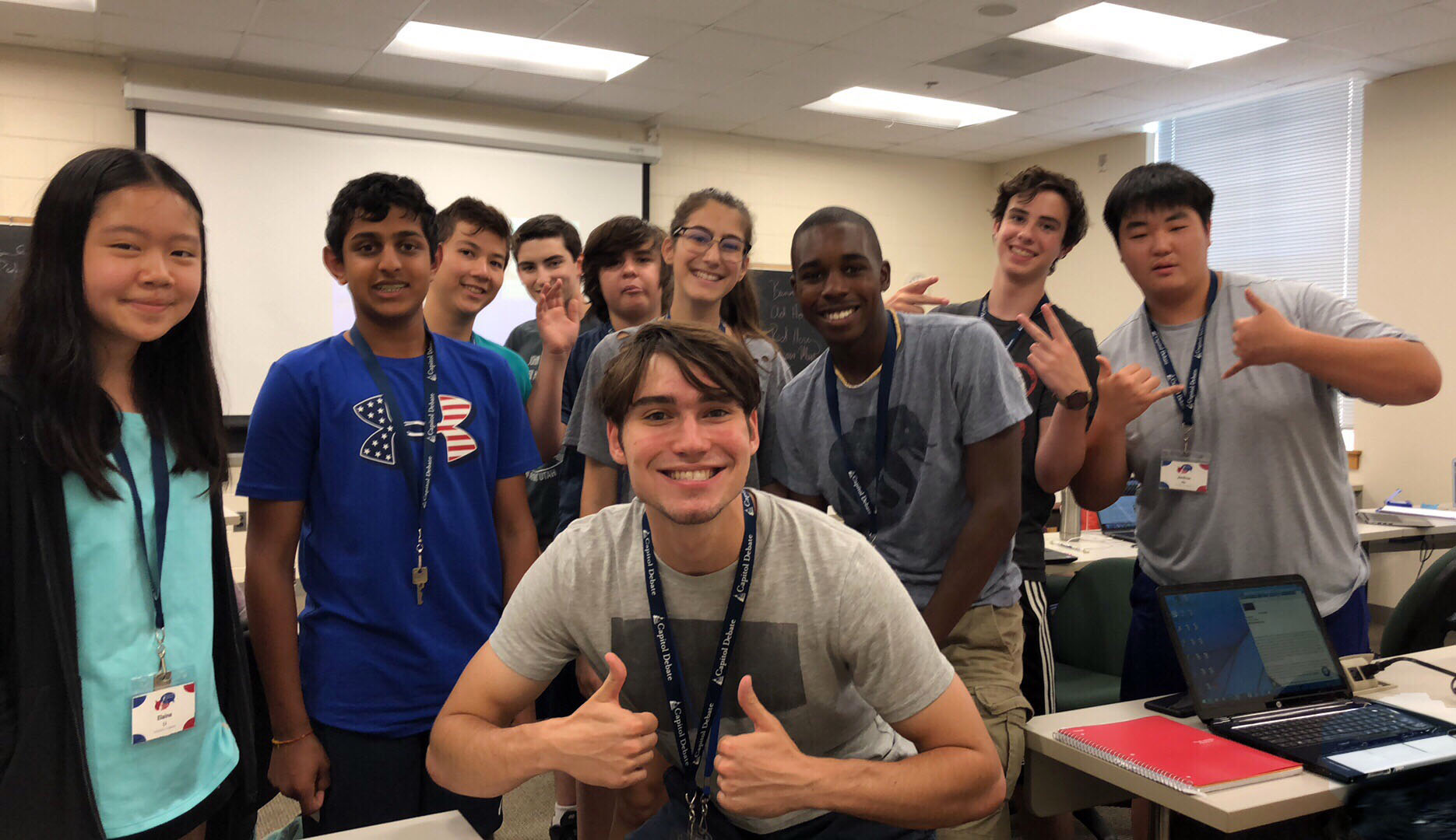 Students practicing debate skills in groups