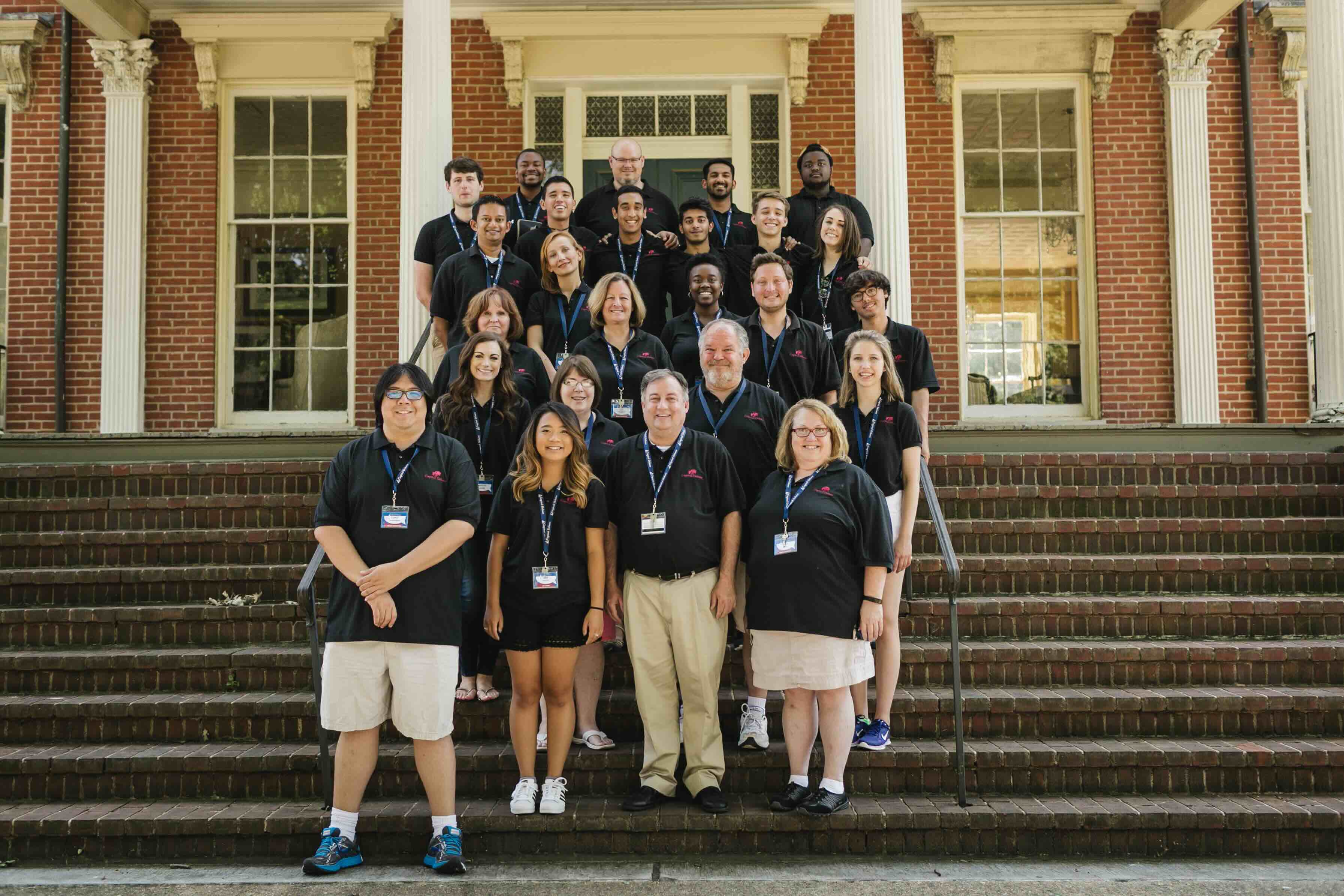 Capitol Debate instructors working with students